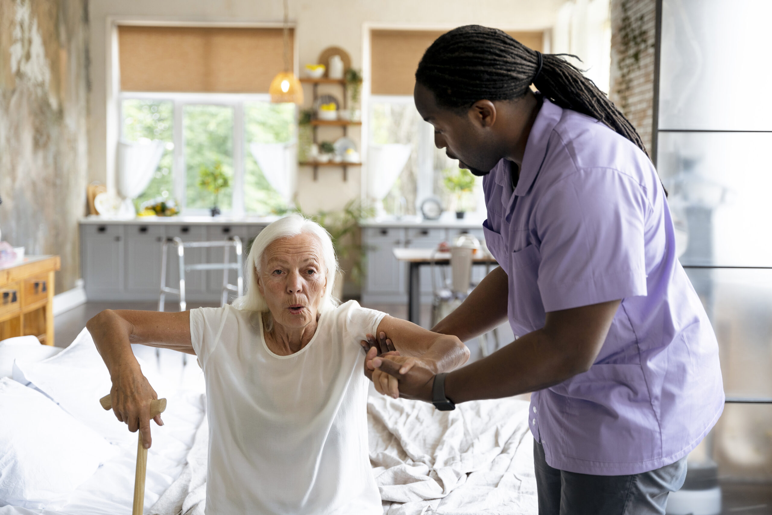 domiciliary care in porthcawl social-worker-taking-care-old-woman(2)