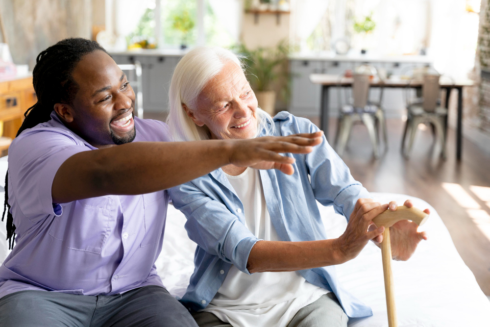 Learning Disabilities Care in South Wales - Social worker helping a senior woman